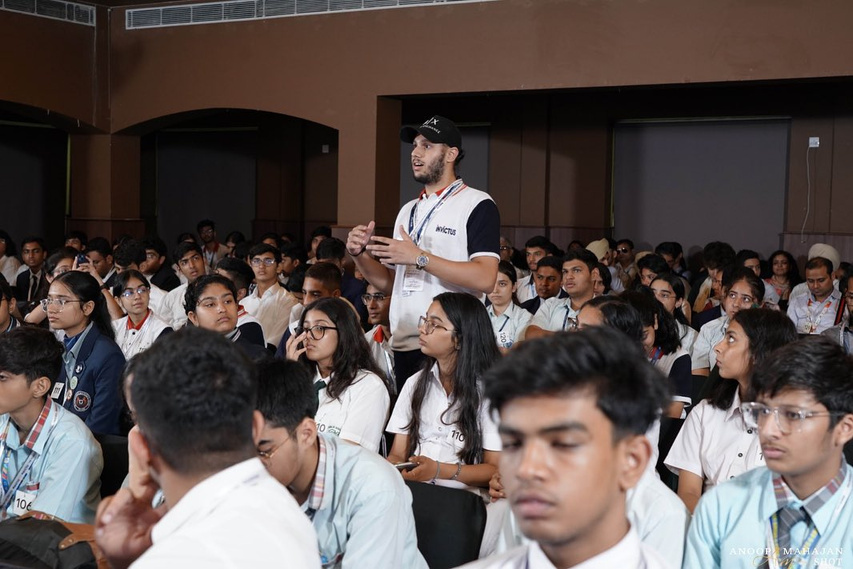 Students asking questions at YEY